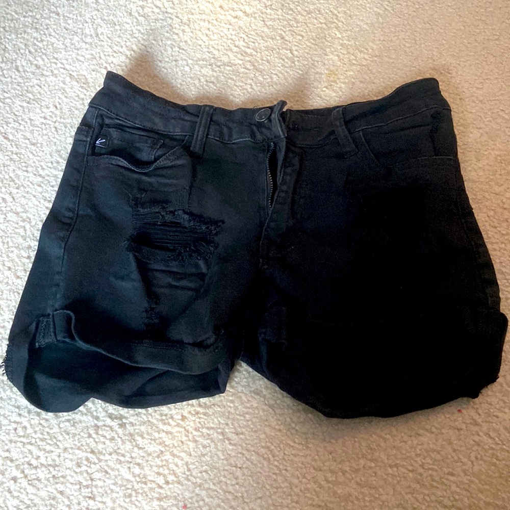 black ripped shorts